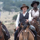 (From left) Rachel Brosnahan, Christoph Waltz, and Warren Burke in Walter Hill’s Dead For A Dollar